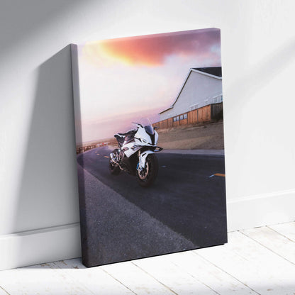 BMW S1000RR motorcycle against sunset sky on vertical canvas wall art with museum-quality print.