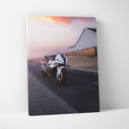 Vertical canvas art featuring BMW S1000RR motorcycle on road at sunset, museum-quality wall art.