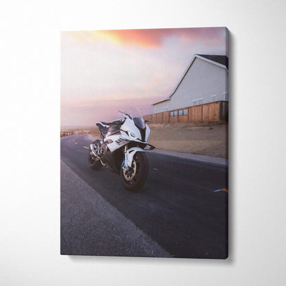 Vertical canvas art of a BMW S1000RR motorcycle on an empty road at sunset, modern wall art.