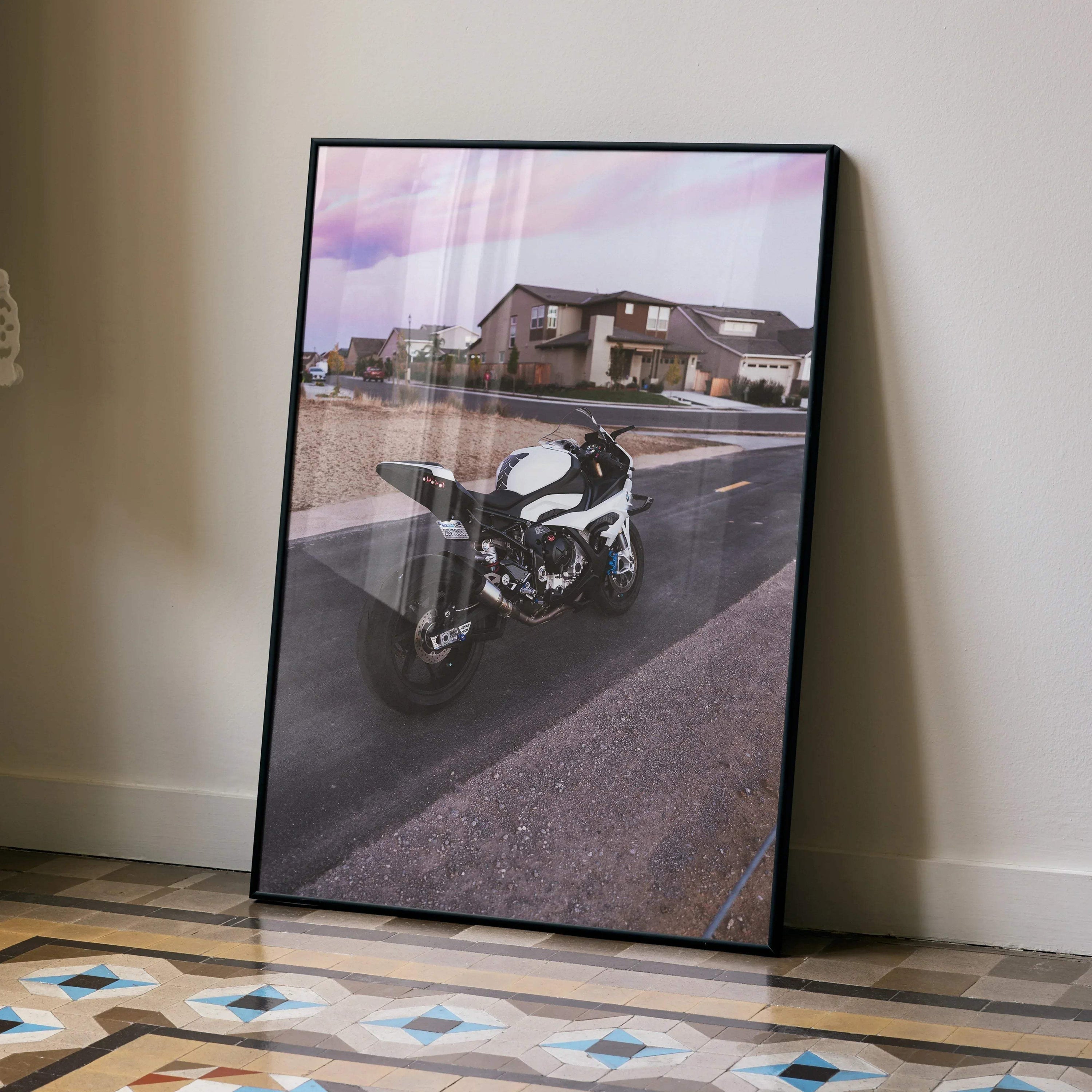 BMW S1000RR motorcycle poster leaning against wall with suburban house background, wall art.