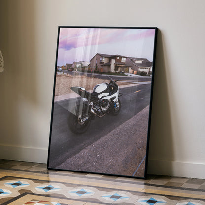 BMW S1000RR motorcycle poster leaning against wall with suburban house background, wall art.
