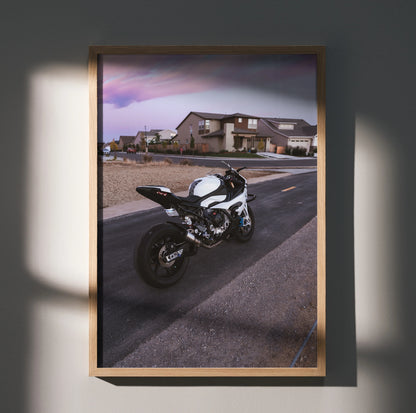 BMW S1000RR motorcycle poster with modern house and sunset, sleek black and white wall art.