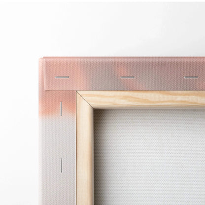 Close-up of wooden stretcher frame with tightly stretched canvas for wall art print.