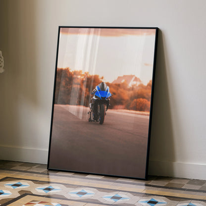 Yamaha R1 motorcycle poster with blue bike riding on road, sunset background wall art.