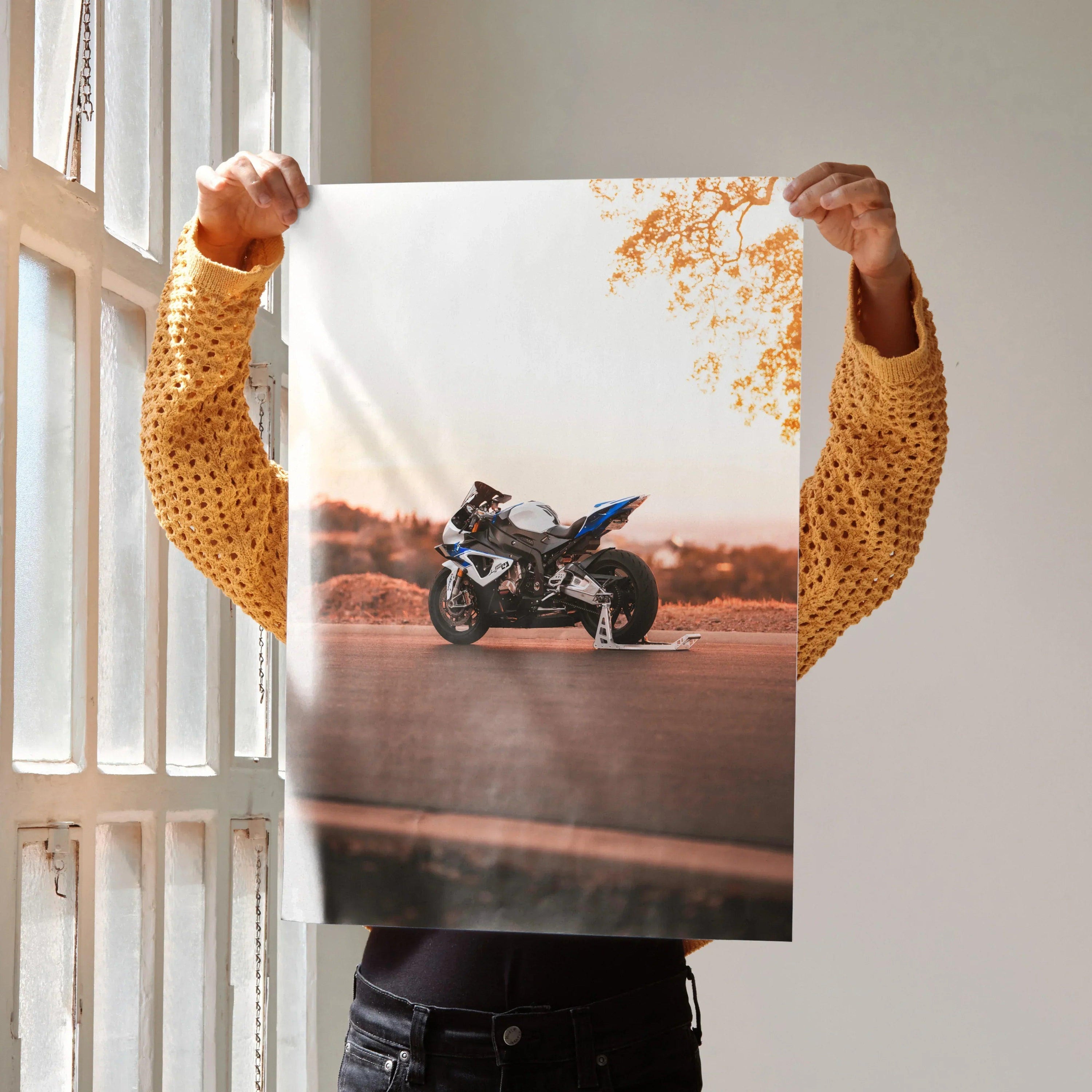 BMW S1000RR HP4 motorcycle poster wall art with orange floral accents and sunset background.