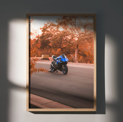 Yamaha YZF-R1 motorcycle poster on wall with autumn trees, blue sportbike, and road background wall art.