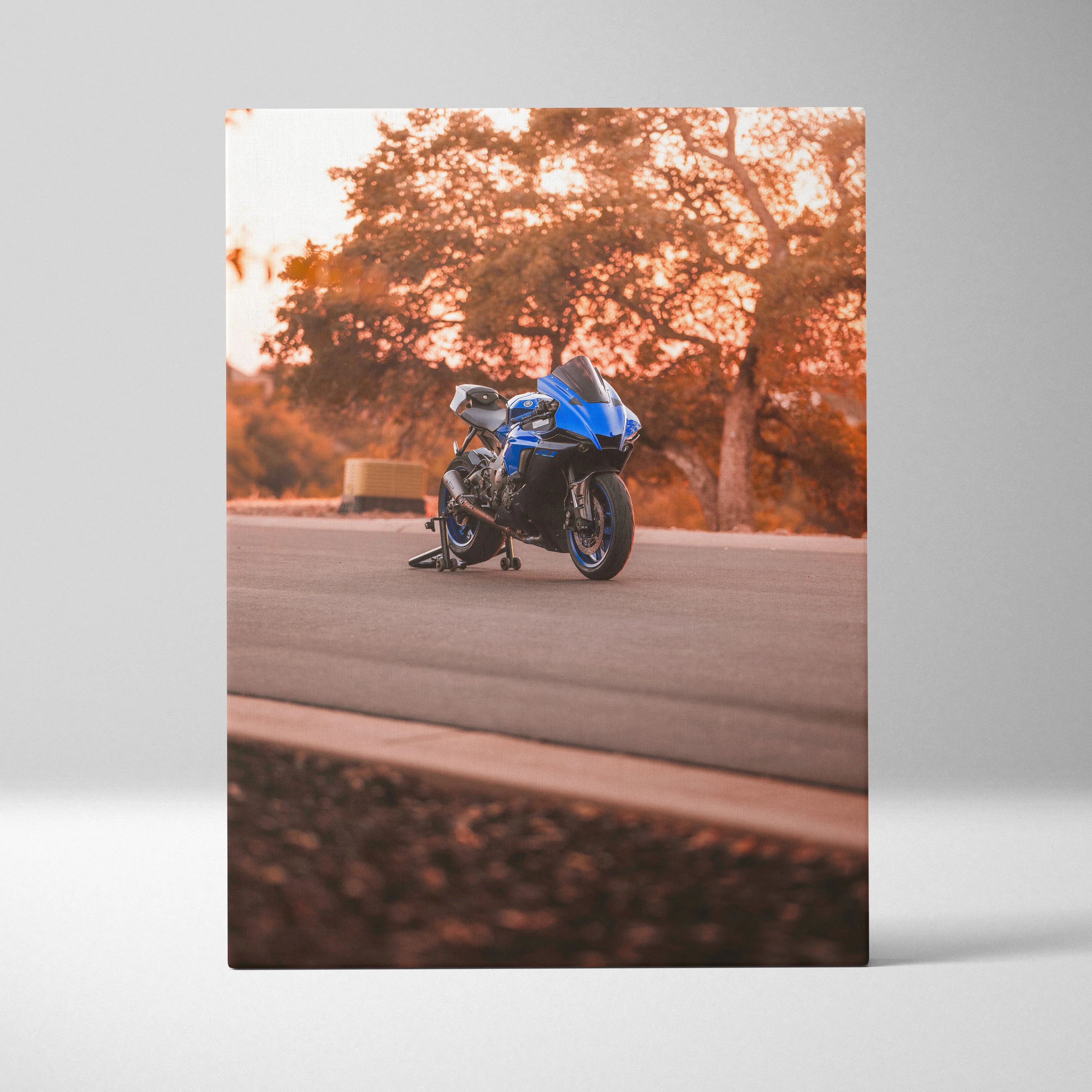 Blue Yamaha R1 motorcycle on road with autumn trees background vertical canvas wall art.