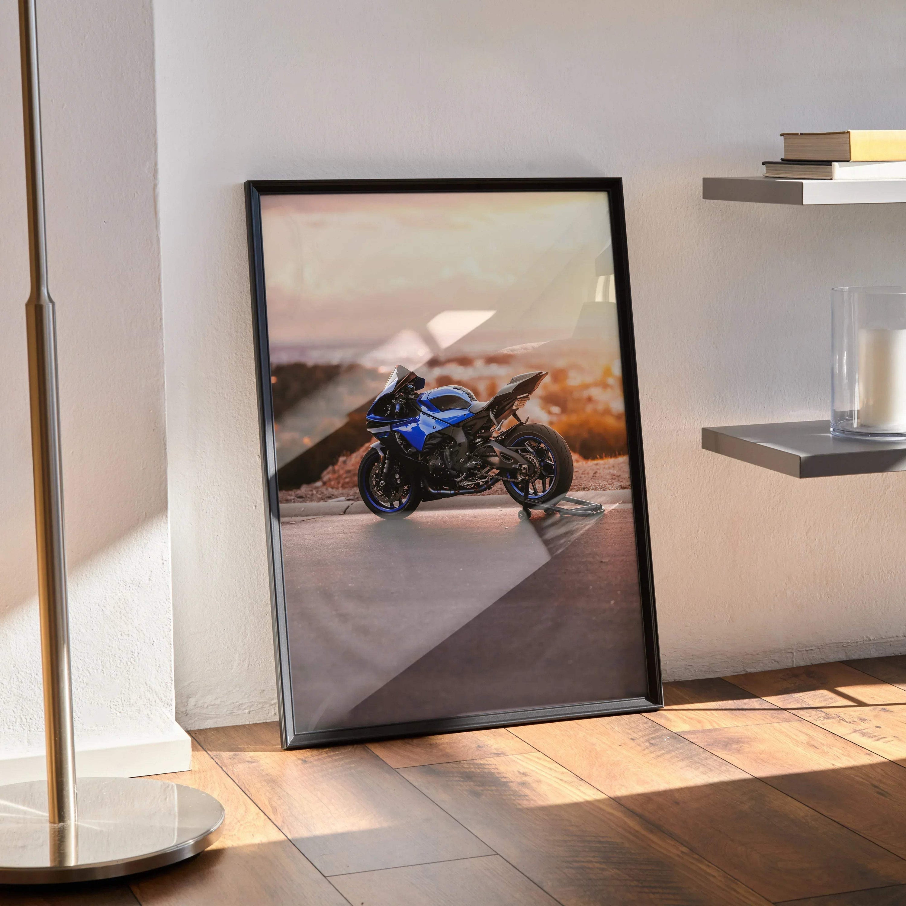 Yamaha R1 motorcycle poster with blue bike on desert road wall art in black frame.
