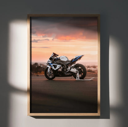 BMW S1000RR HP4 motorcycle poster with sunset backdrop, premium wall art in wooden frame.