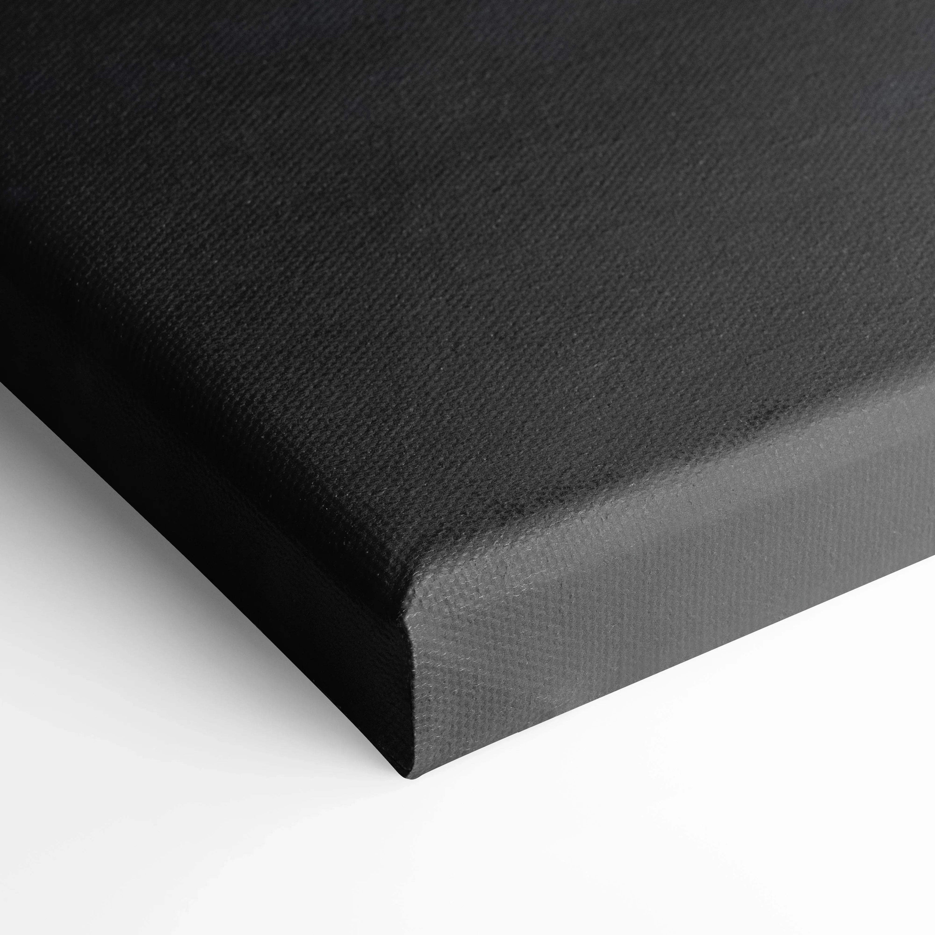 Black stretched canvas corner detail showing texture and profile of high-quality wall art canvas print.