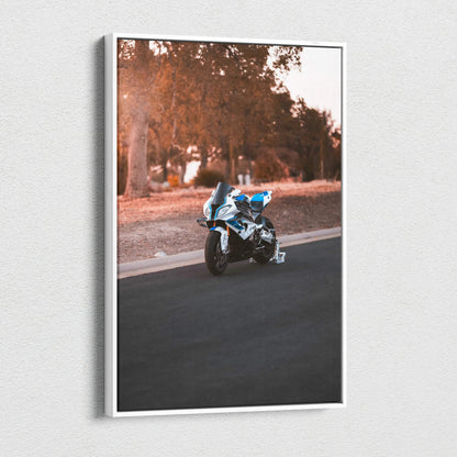 Vertical canvas wall art featuring a BMW S1000RR motorcycle on a scenic road with autumn trees background.