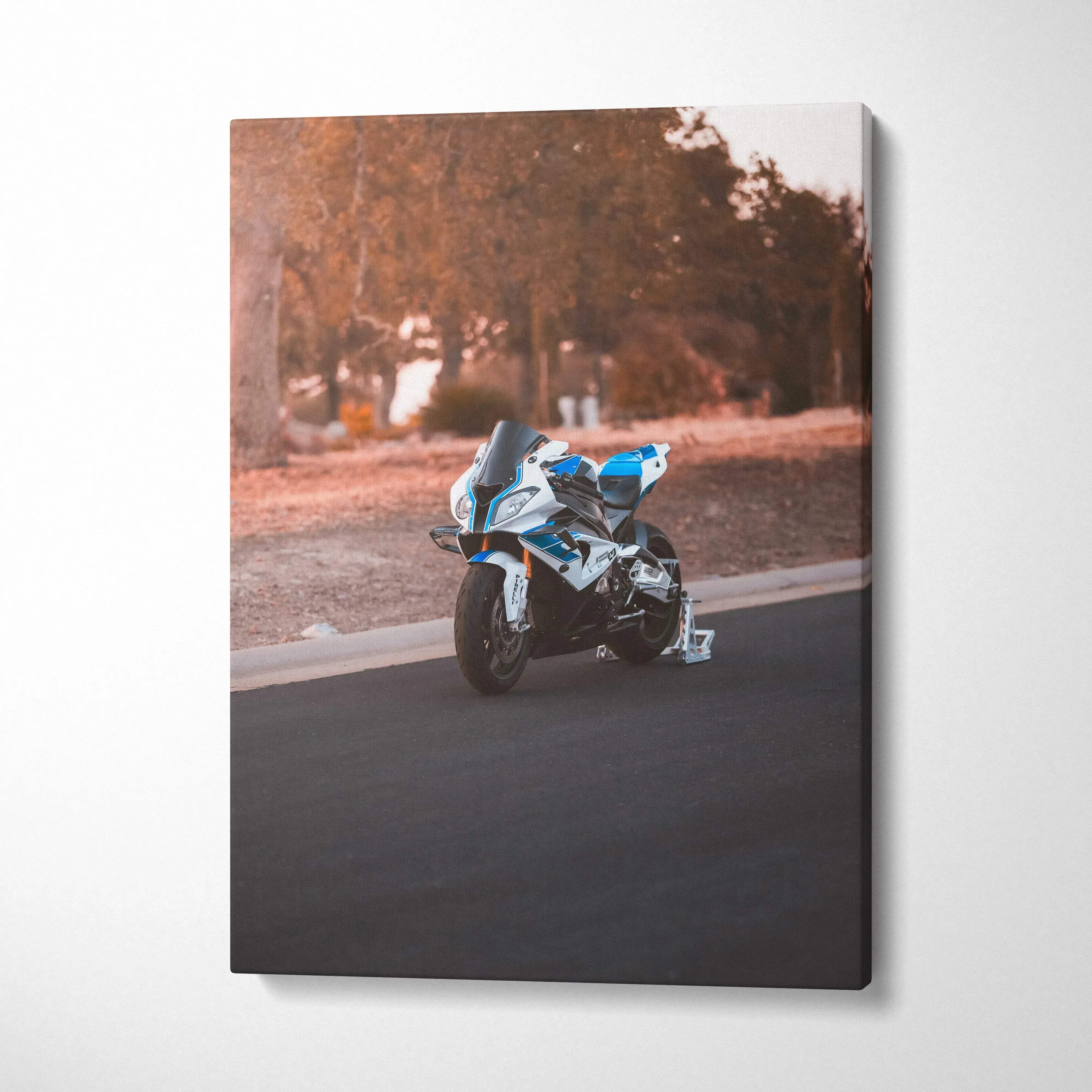 Vertical canvas wall art featuring a BMW S1000RR motorcycle on a road with autumn trees background.