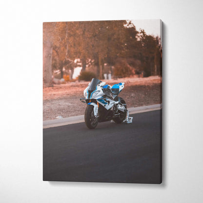 Vertical canvas wall art featuring a BMW S1000RR motorcycle on a road with autumn trees background.