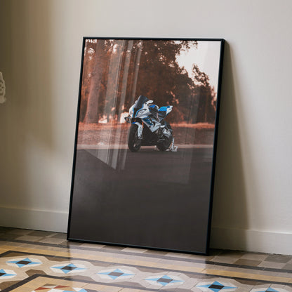 BMW S1000RR HP4 motorcycle wall art poster leaning against beige wall with geometric floor tiles.
