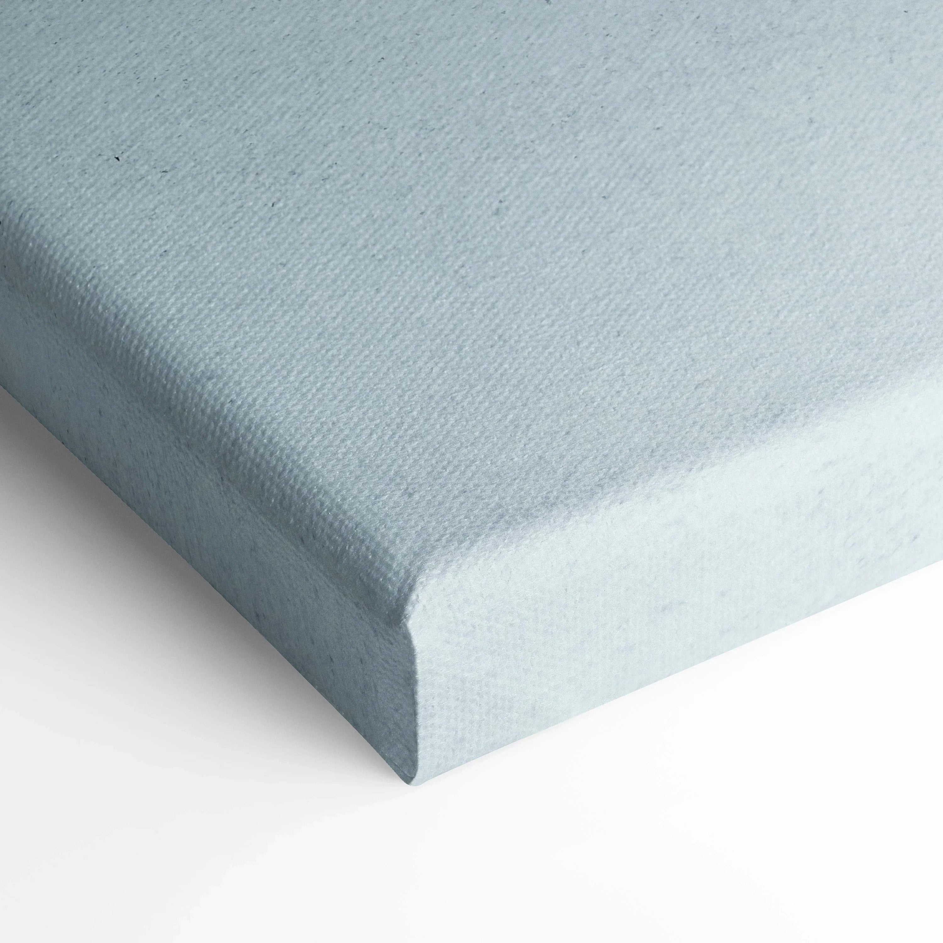 Light gray textured canvas stretched over wooden frame for wall art or canvas art display.