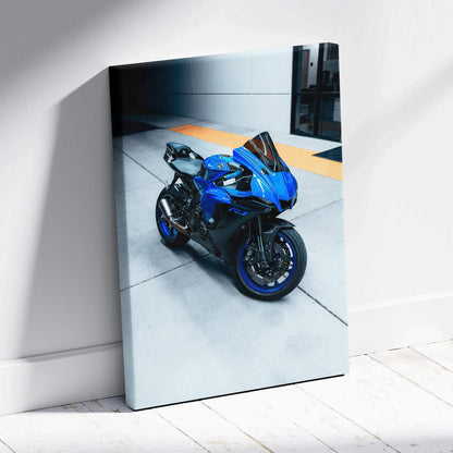 Yamaha R1 blue sport motorcycle on street canvas wall art in vertical format.
