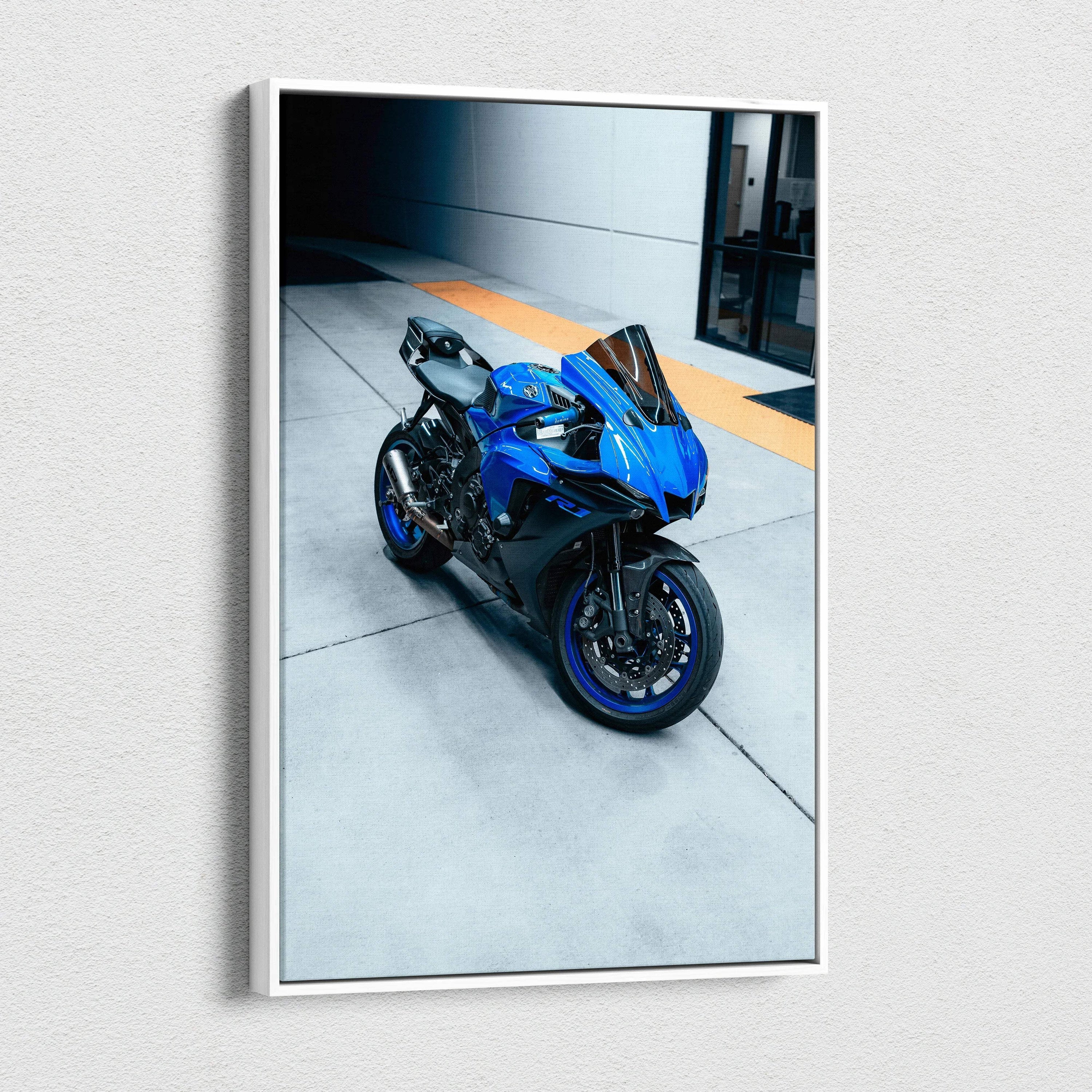 Blue Yamaha R1 motorcycle canvas art wall decor in sleek urban setting, vertical canvas wall art.
