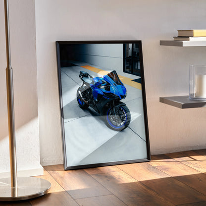 Yamaha R1 motorcycle poster with blue and black bike, modern wall art in black frame.