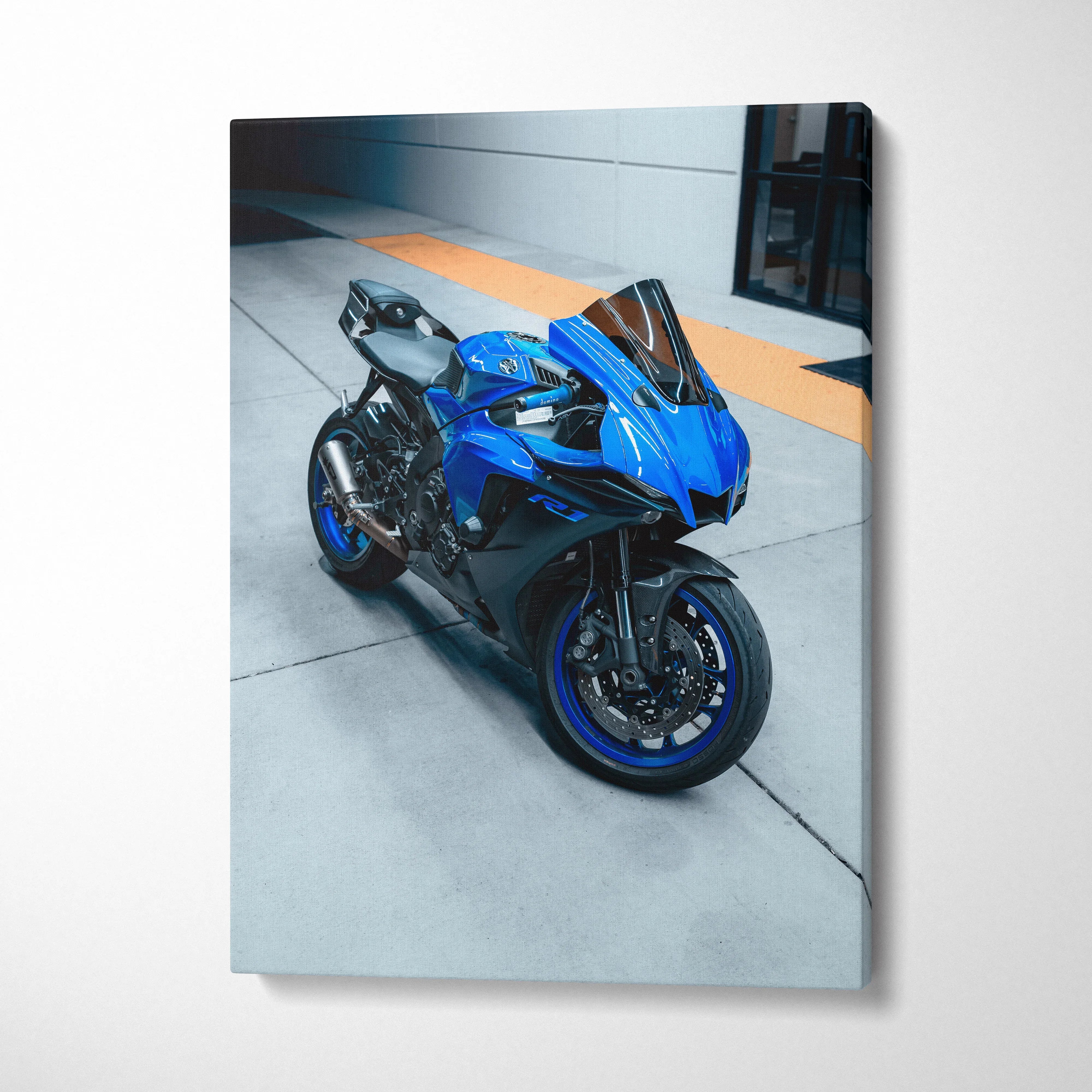Blue Yamaha R1 motorcycle canvas art with urban background for wall art display.