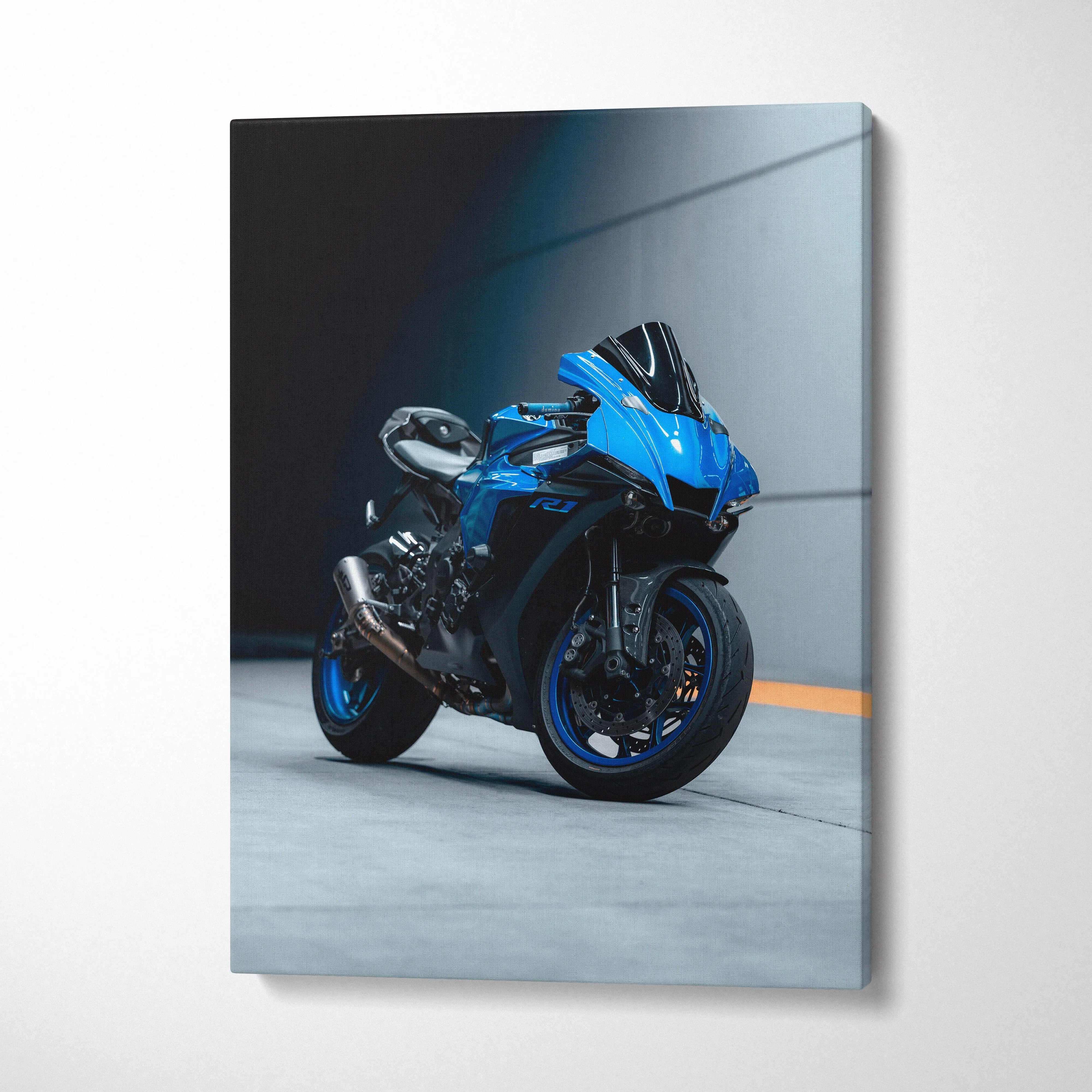 Yamaha R1 blue motorcycle canvas art in modern urban setting vertical wall art.