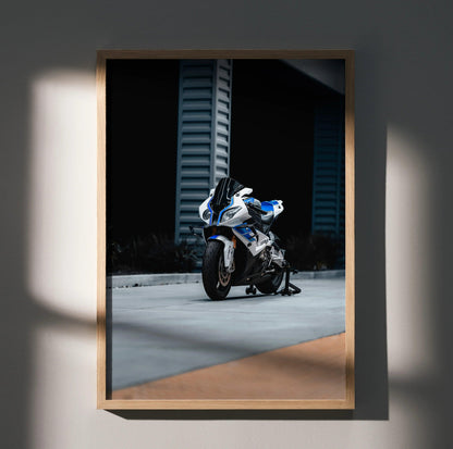 BMW S1000RR HP4 motorcycle poster with blue and white racing design wall art in wooden frame.