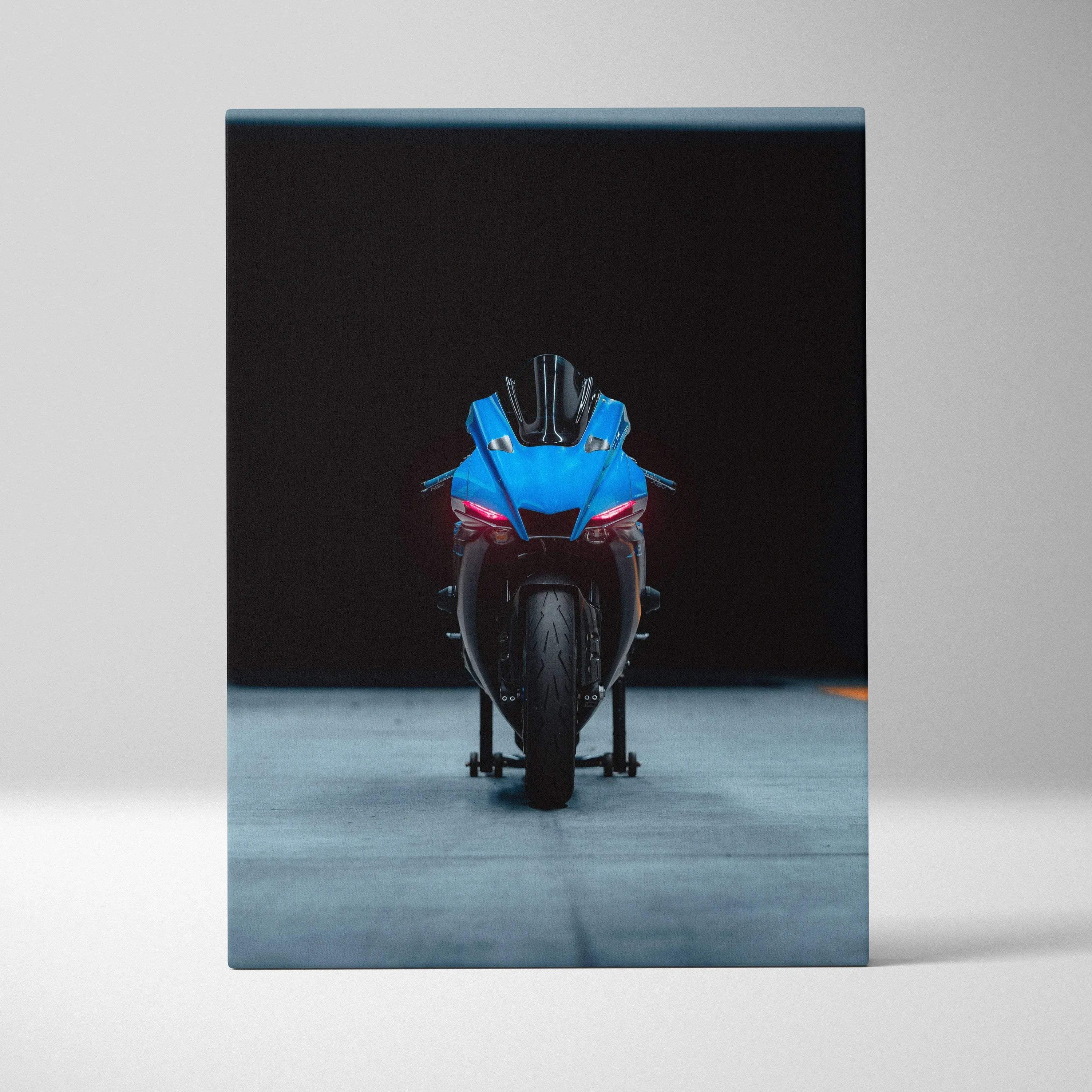 Yamaha R1 blue motorcycle front view on black background canvas wall art.