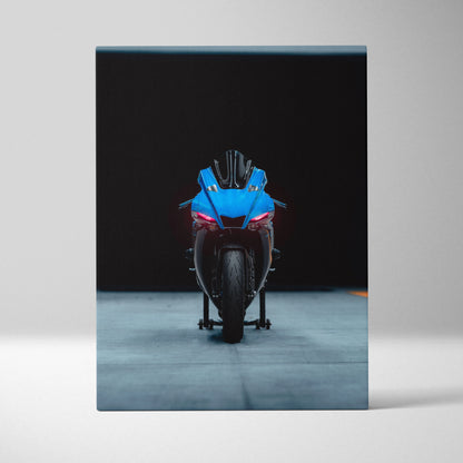 Yamaha R1 blue motorcycle front view on black background canvas wall art.