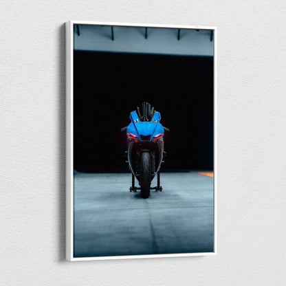 Yamaha R1 motorcycle striking front view on dark background canvas wall art.