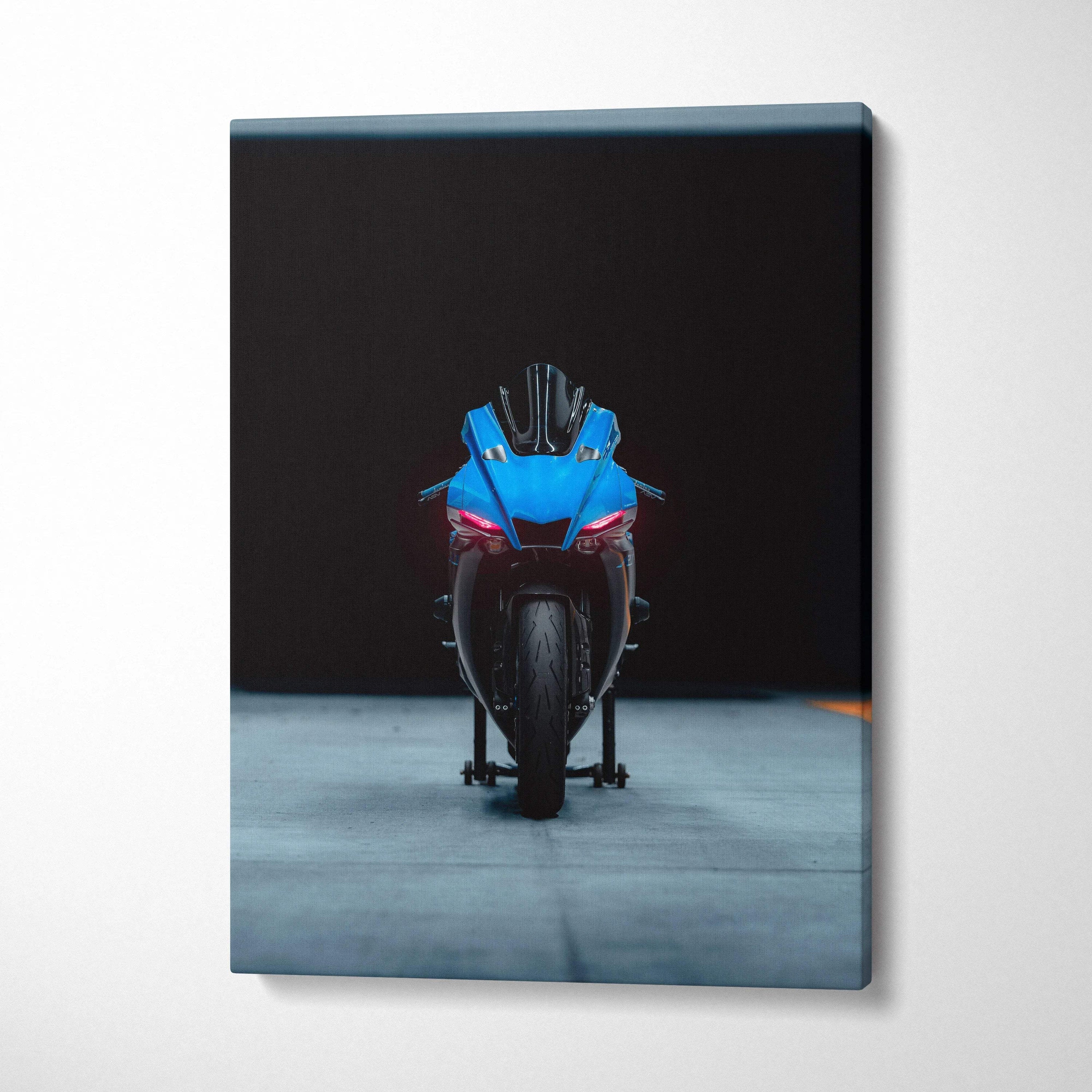 Yamaha R1 motorcycle front view on black background vertical canvas wall art.