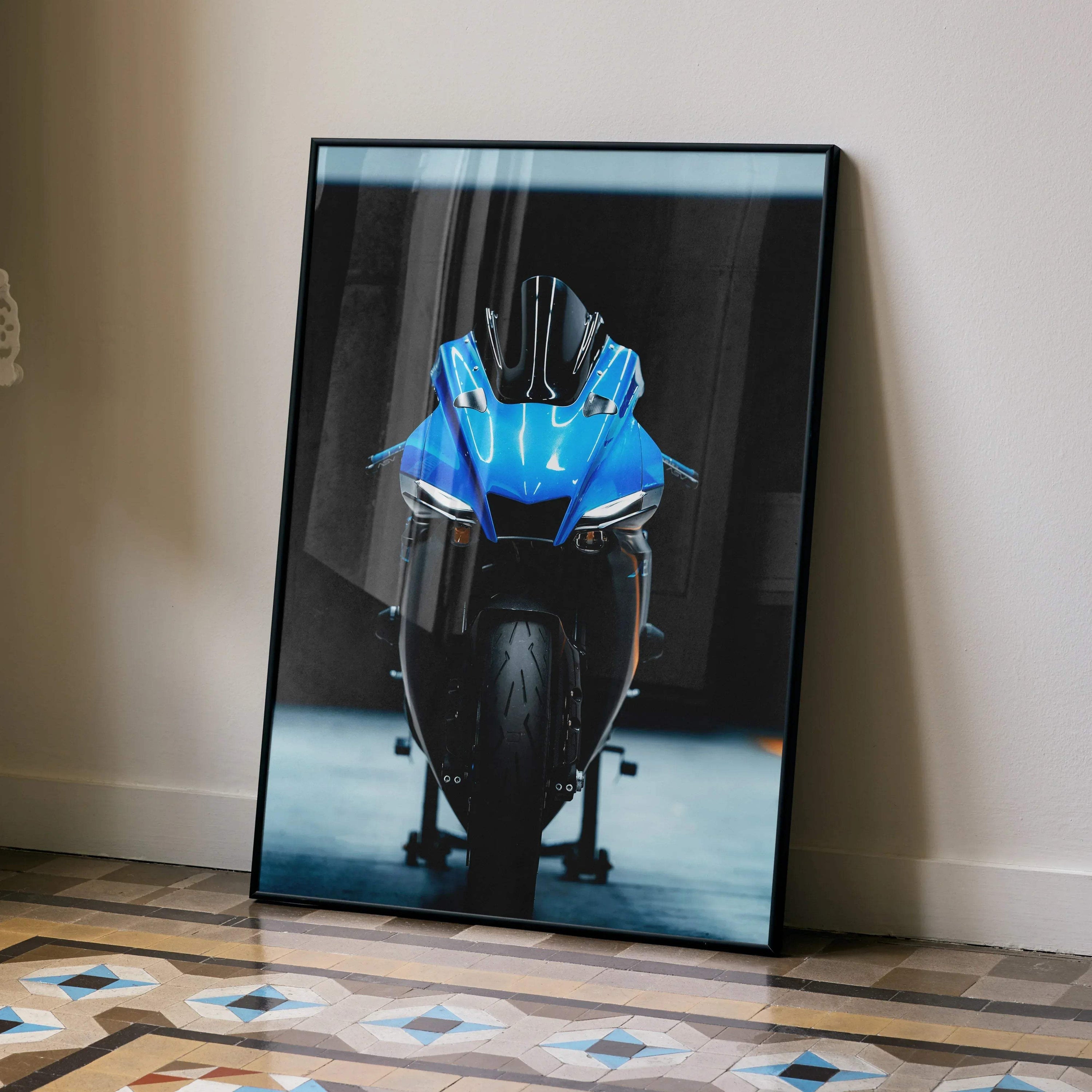 Yamaha YZF-R1 blue motorcycle poster leaning against wall, modern wall art with dark background.