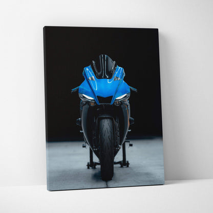 Yamaha R1 motorcycle front view on black background canvas wall art in vertical format.