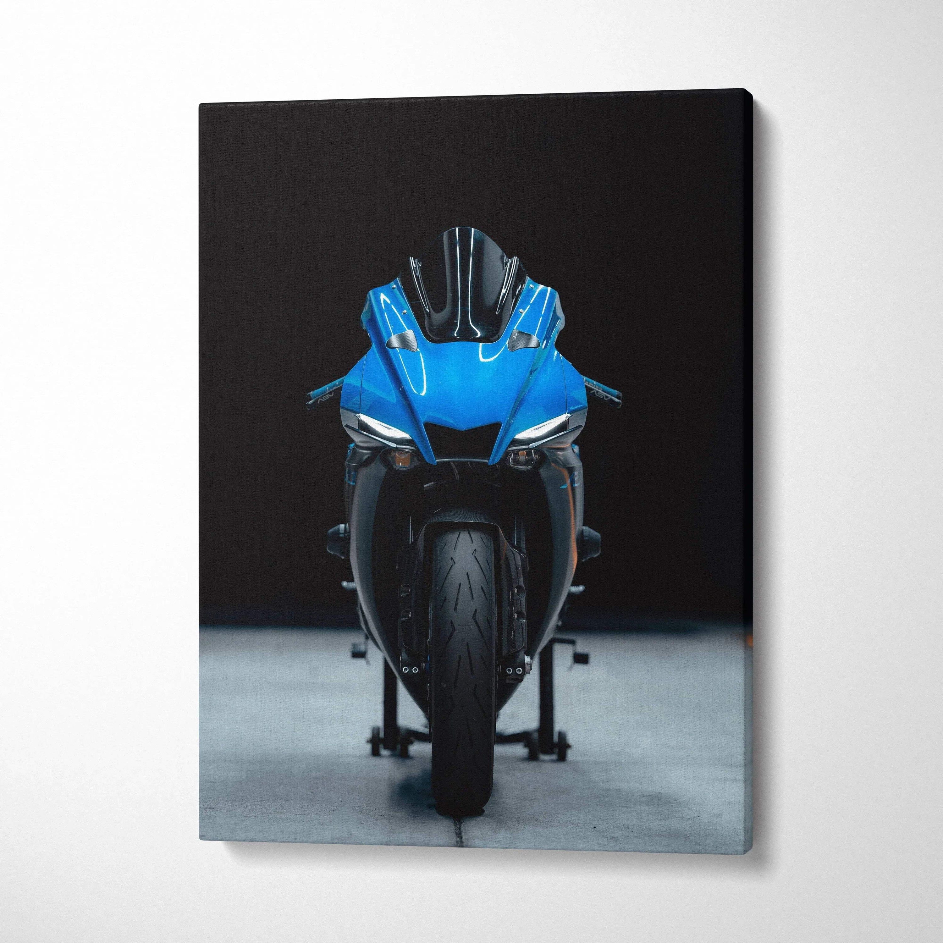 Blue Yamaha R1 motorcycle front view on black background canvas wall art.