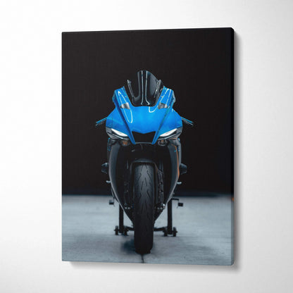 Blue Yamaha R1 motorcycle front view on black background canvas wall art.