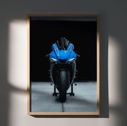 Yamaha R1 motorcycle front view poster with blue bike on black background wall art.