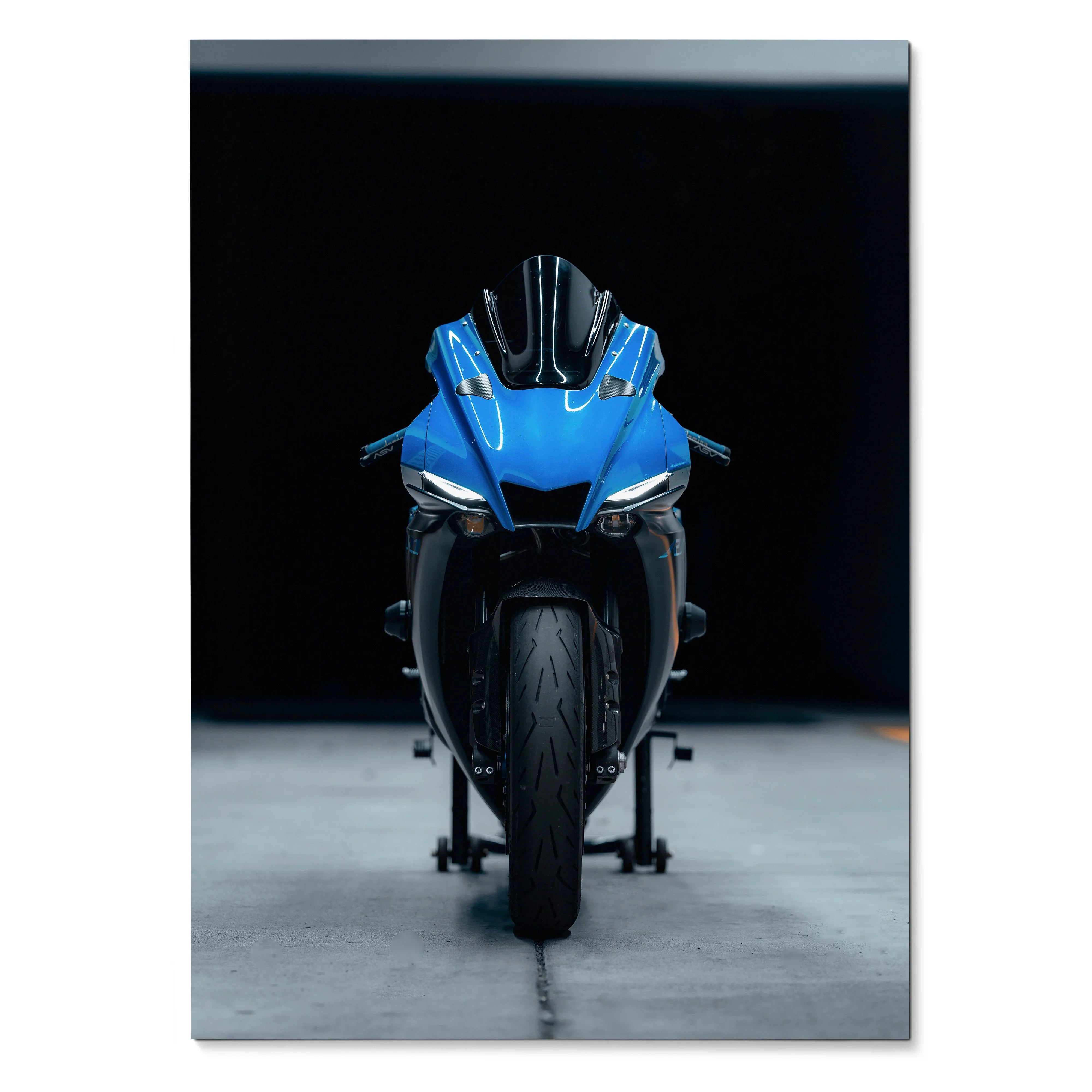 Yamaha R1 motorcycle front view poster with blue bike on black background wall art.