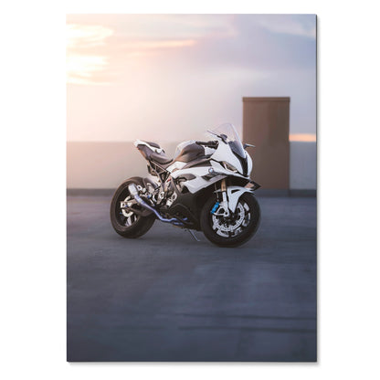 BMW S1000RR motorcycle parked at sunset with soft sky background poster wall art.