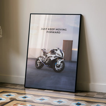 BMW S1000RR motorcycle poster with motivational text "Just Keep Moving Forward" in black frame wall art.