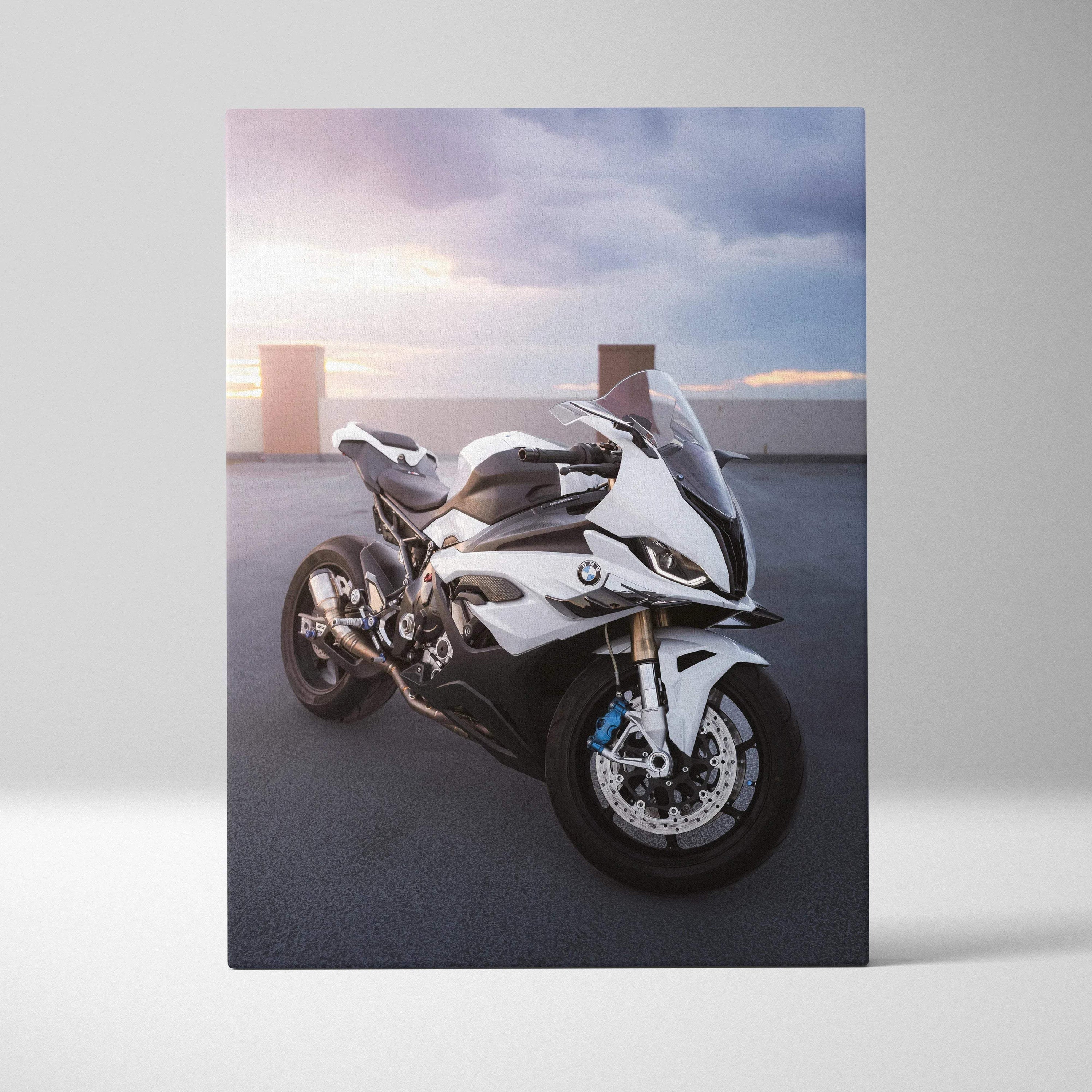 BMW S1000RR sport motorcycle against a sunset sky on vertical canvas wall art.