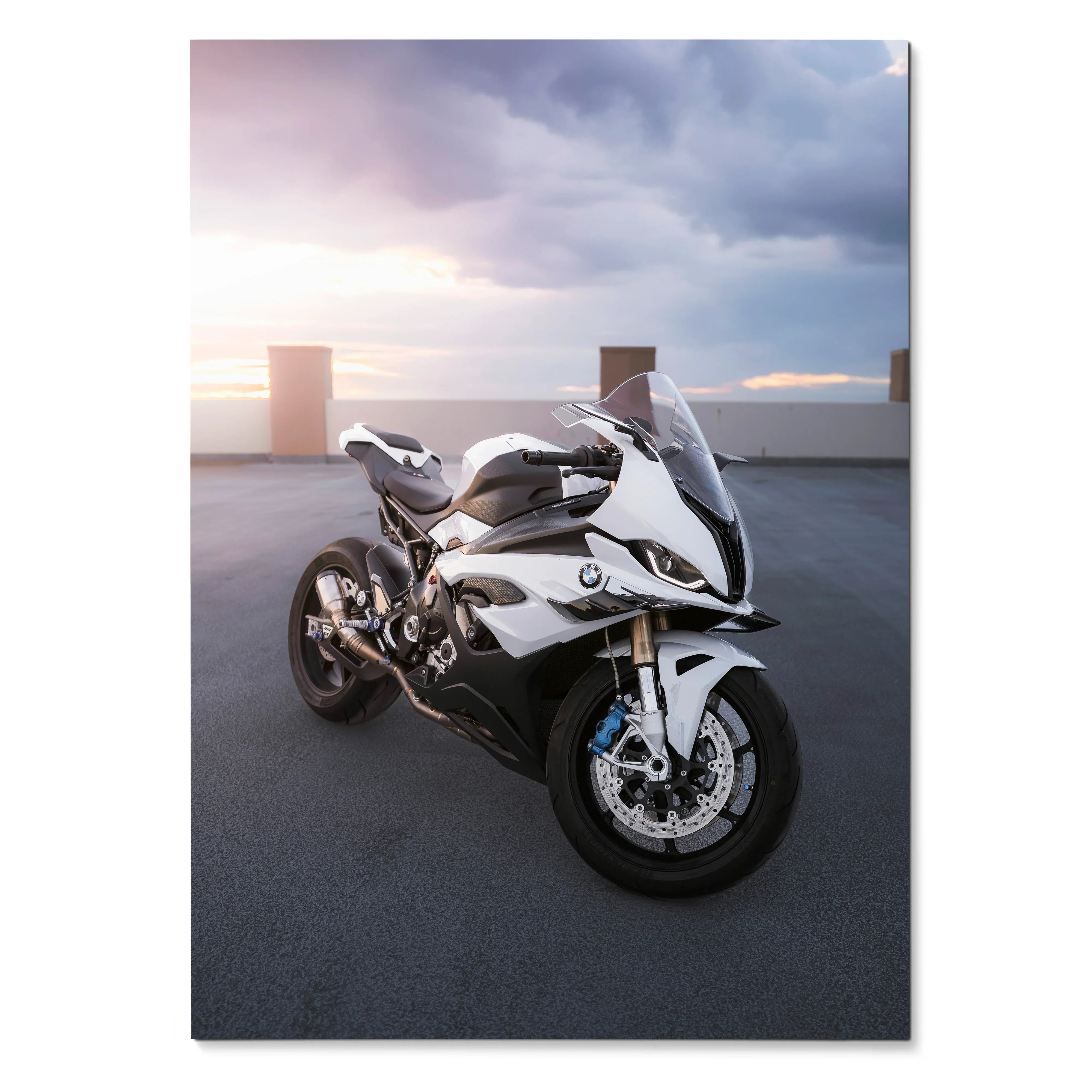 BMW S1000RR motorcycle poster with white sportbike on rooftop at sunset wall art.