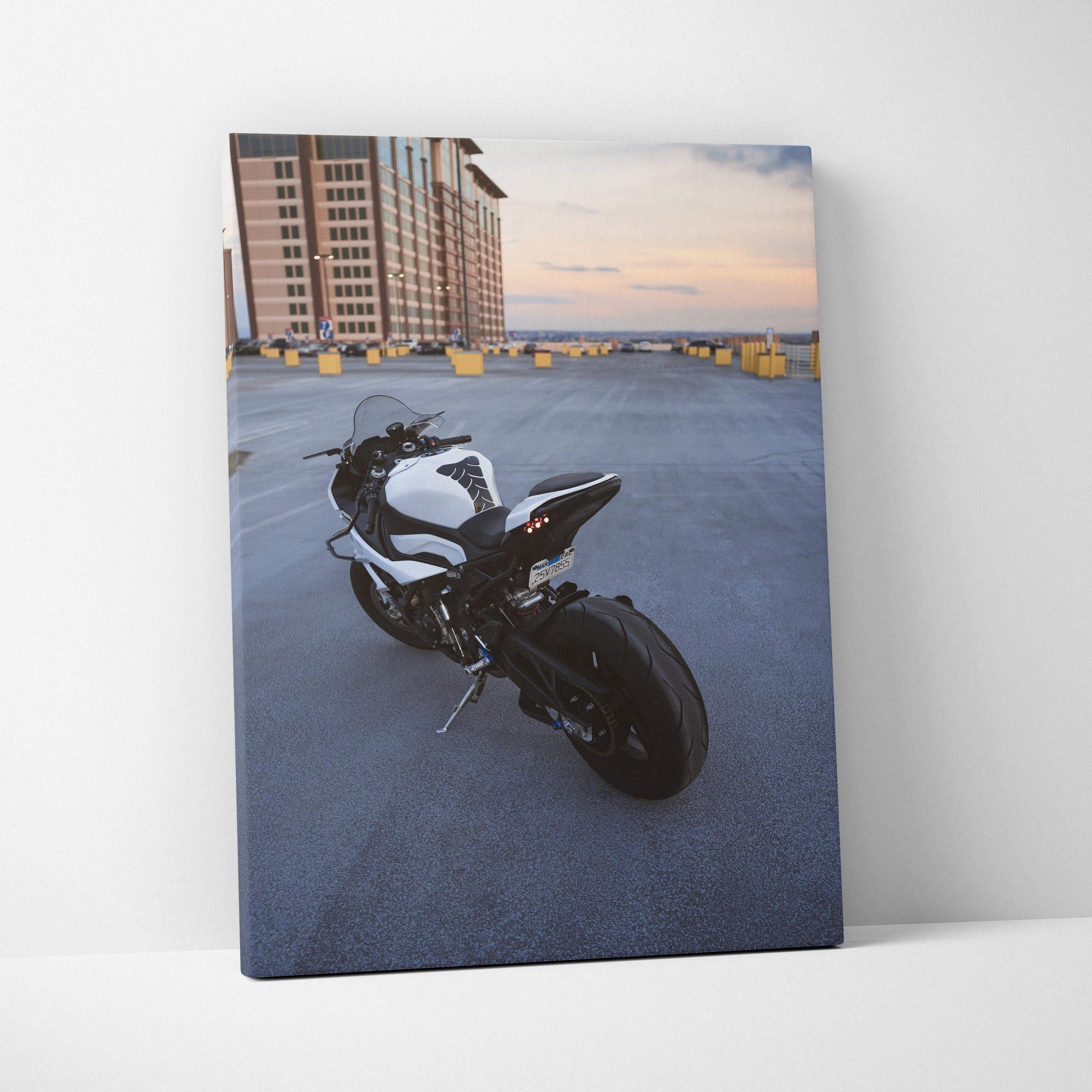 BMW S1000RR motorcycle on rooftop parking at sunset vertical canvas wall art.