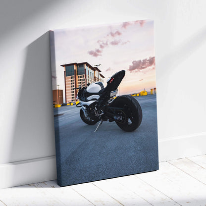 BMW S1000RR motorcycle against sunset urban backdrop on vertical canvas wall art.