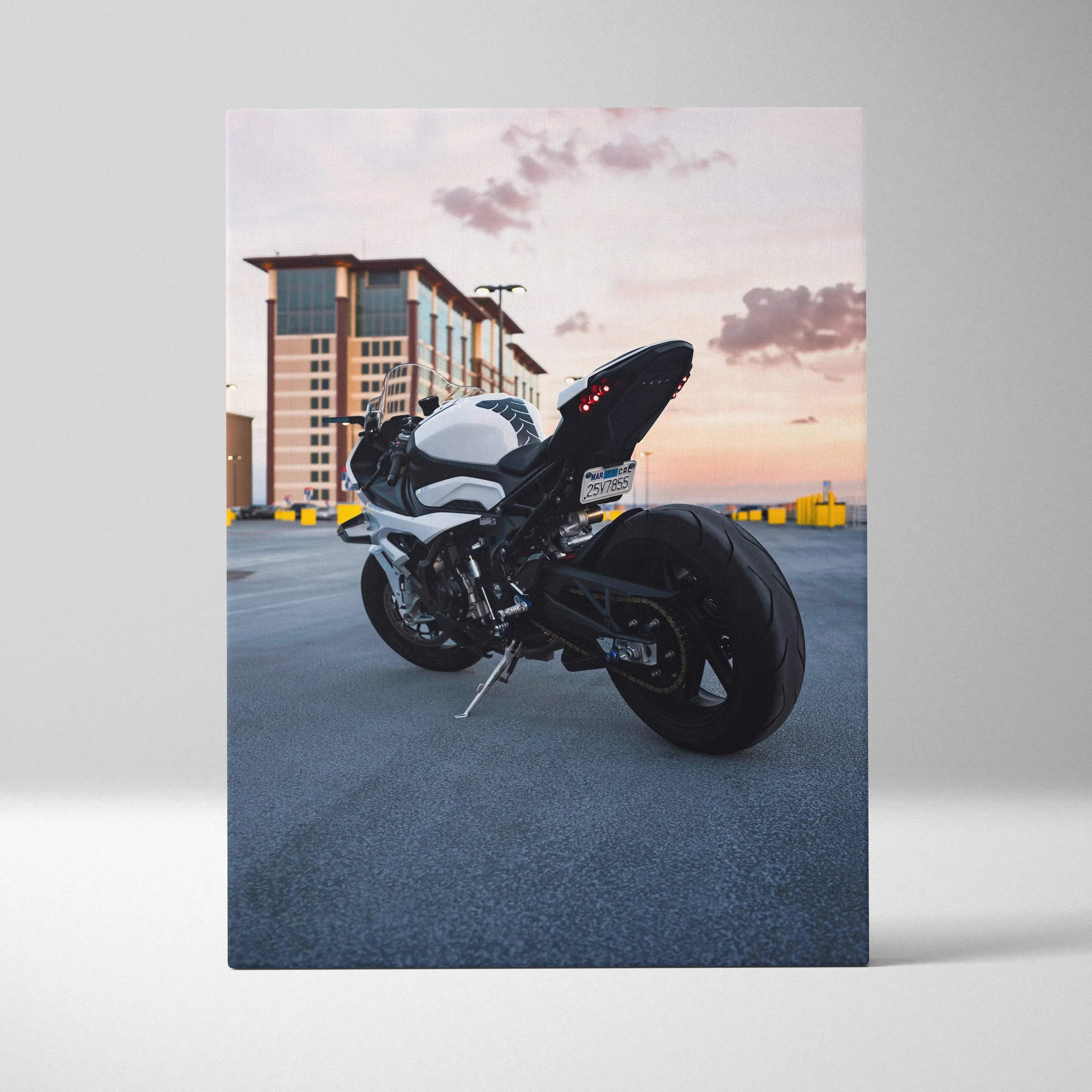 BMW S1000RR motorcycle at sunset printed on vertical canvas wall art with high-resolution detail.
