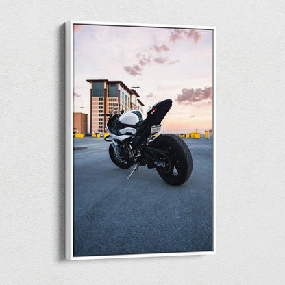 BMW S1000RR motorcycle at sunset on vertical canvas wall art with modern building background.