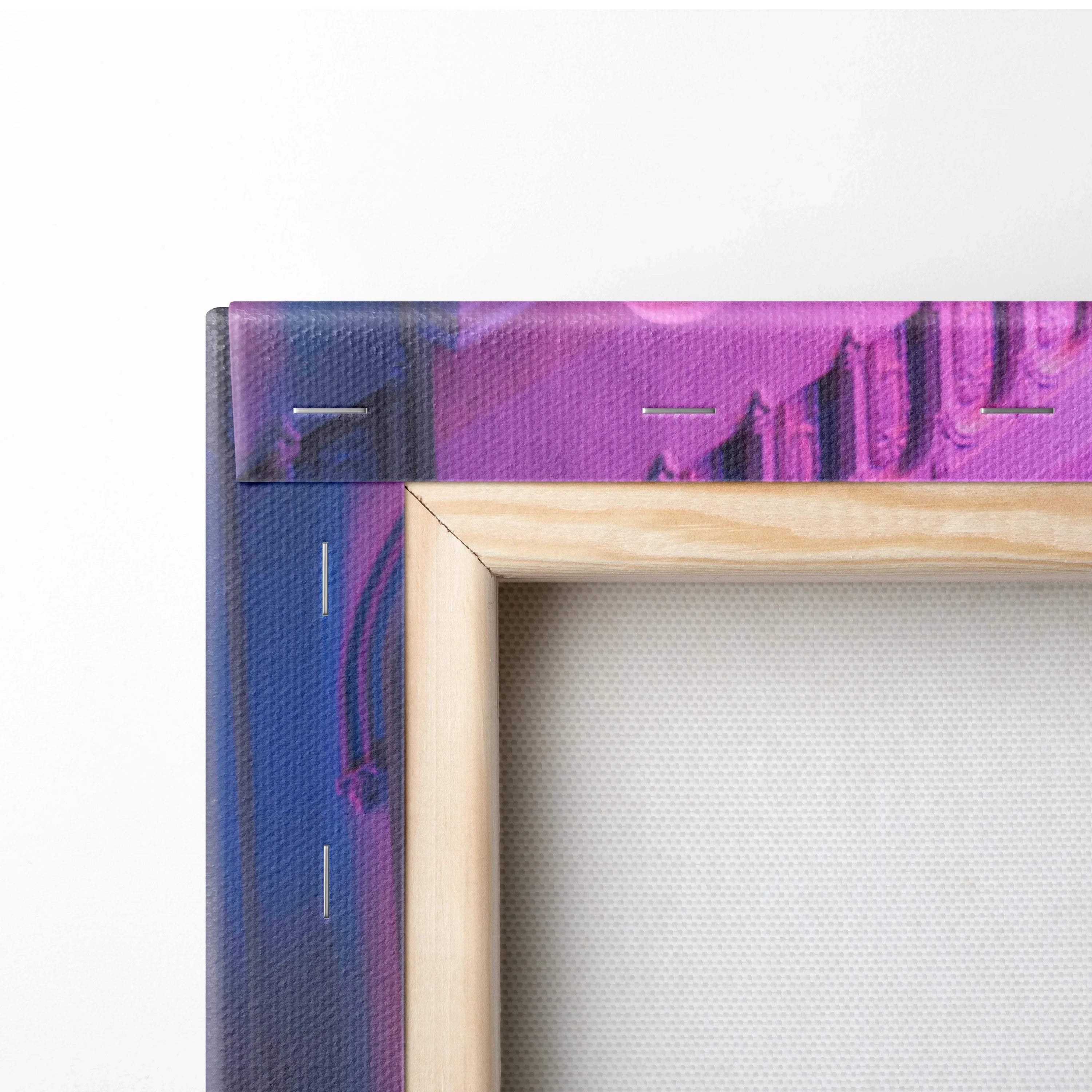 Close-up of wooden frame corner on vibrant purple and blue canvas art wall art print.