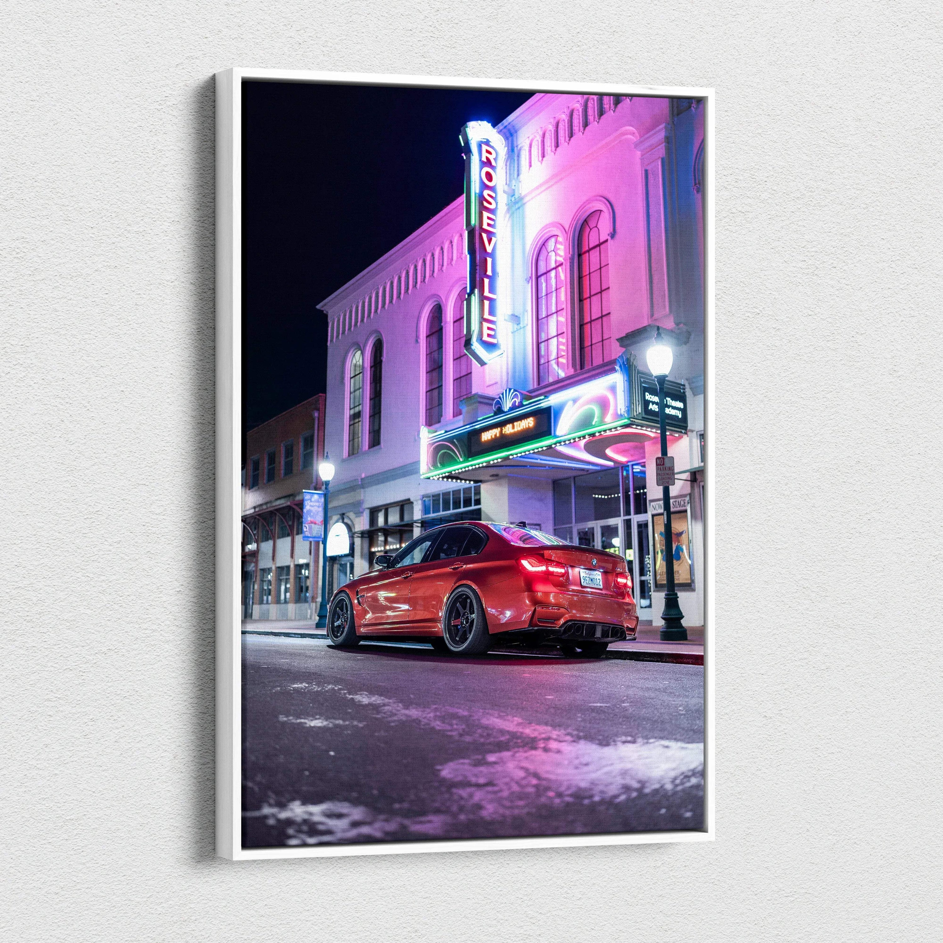 BMW F80 M3 red car parked in front of neon-lit theater at night, vertical canvas wall art.