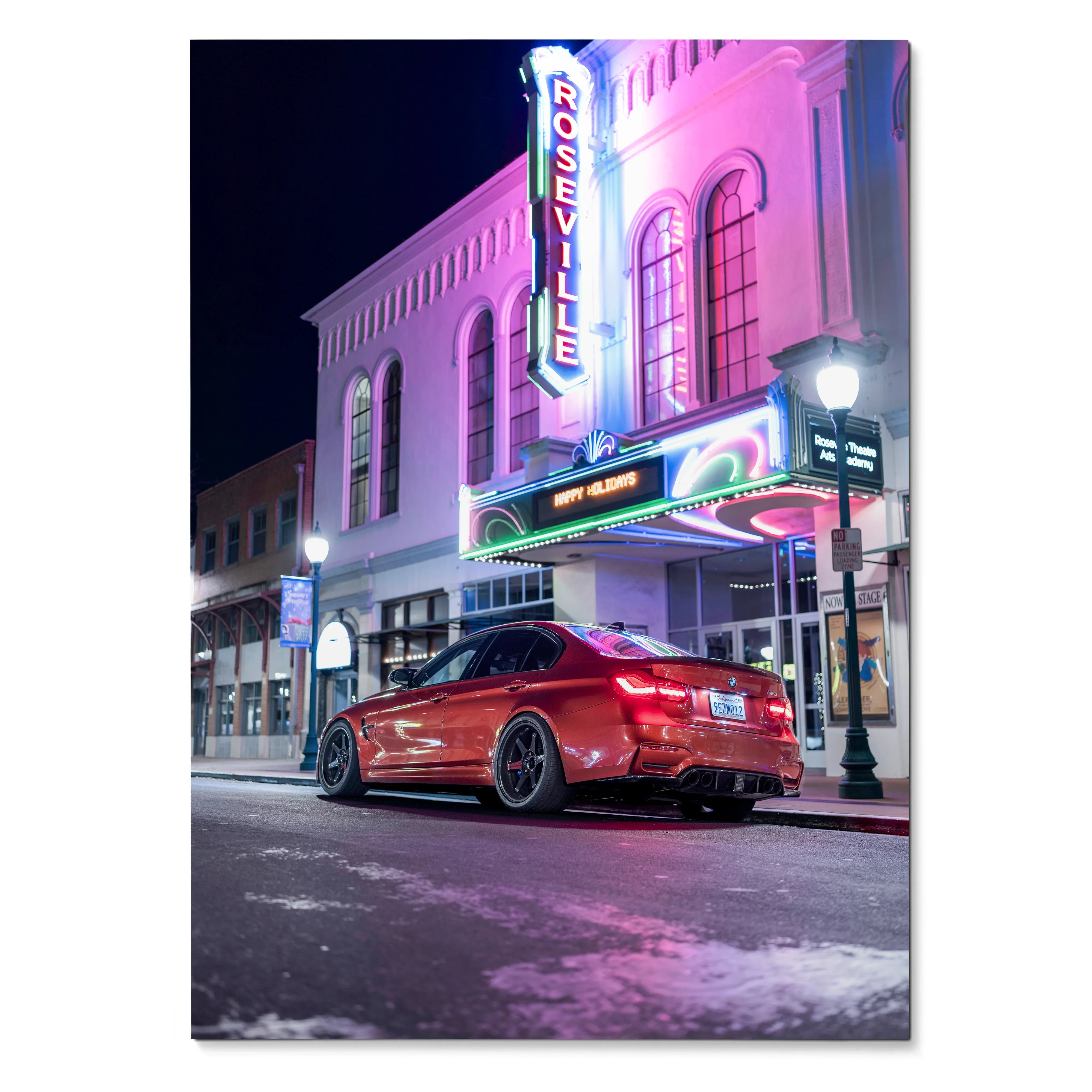 BMW F80 M3 poster featuring a red car parked by a neon-lit theater at night wall art.