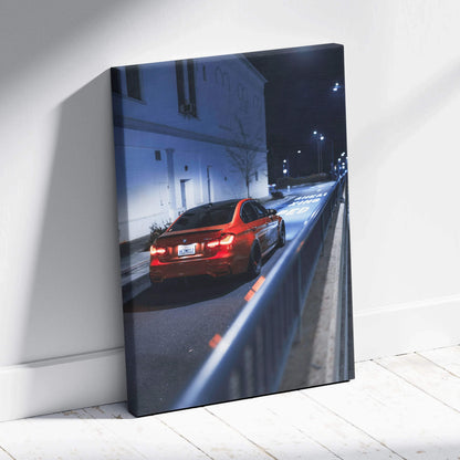 Vertical canvas art featuring a red BMW F80 M3 on a nighttime city street, high-resolution wall art.