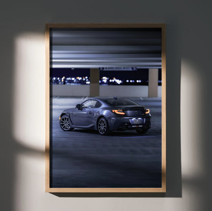 Toyota GR86 sports car displayed at night in parking garage poster wall art.