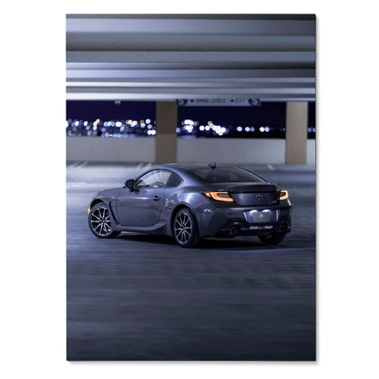 Toyota GR86 sports car in sleek gray, captured at night in urban parking poster wall art.