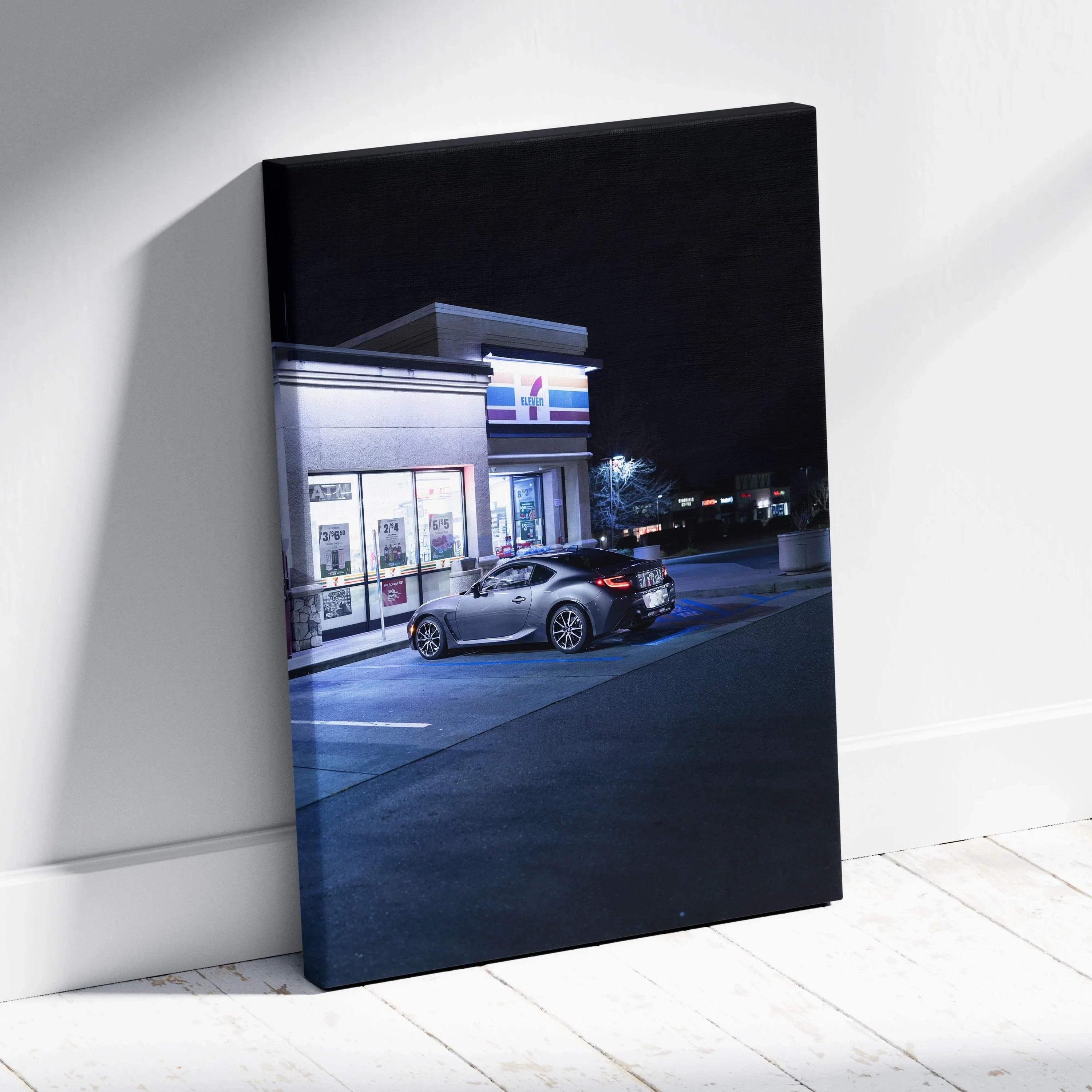 Toyota GR86 parked outside a lit convenience store at night on vertical canvas wall art.